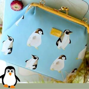 Previously owned: ENSSO 2016 Penguins purse/cluch